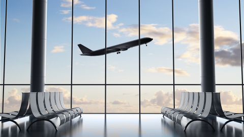 Bild eines Flughafens mit einem Flugzeug, welches started